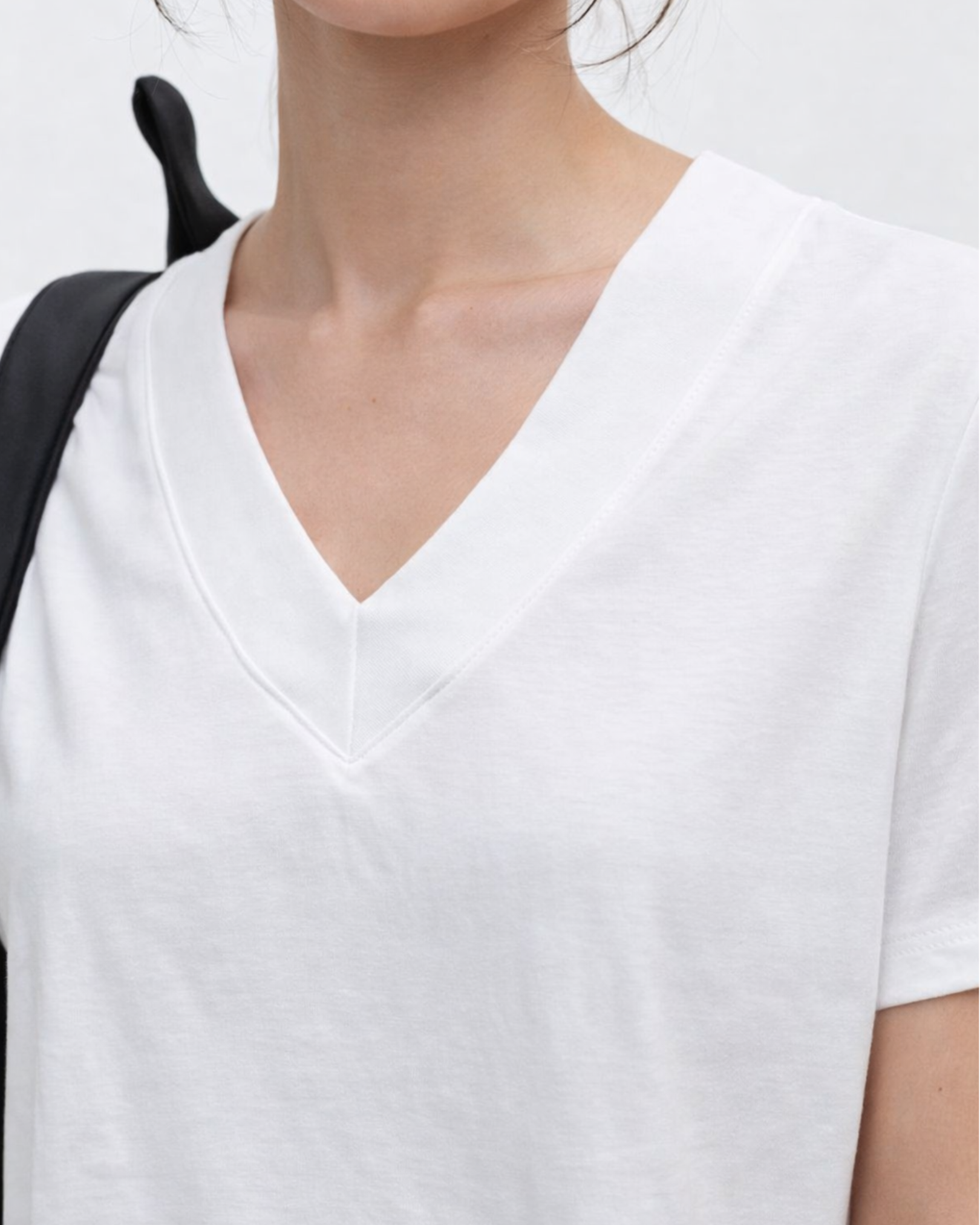 White V-neck top